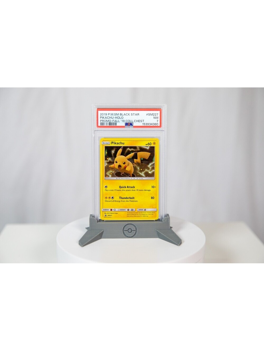 2019 P.M. SM Black Star #SM227 Pikachu Holo Promo-Fall '19 Coll.Chest PSA 7